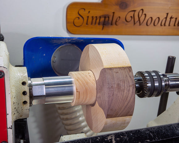 Glue hub with waste block for gluing bowl blank quickly.